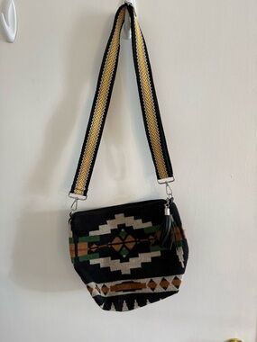 Black Tribal-Patterned Crossbody Bag with Decorative Strap